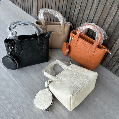 Classic Maria sling crossbody bag with coin pouch.