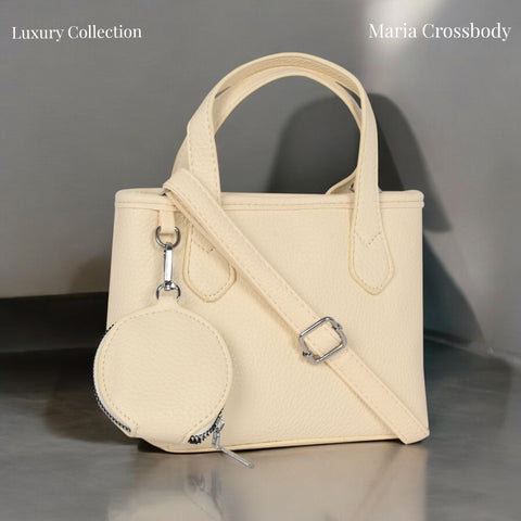 Classic Maria sling crossbody bag with coin pouch.