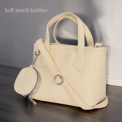 Classic Maria sling crossbody bag with coin pouch.
