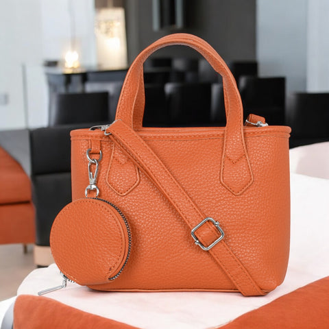 Classic Maria sling crossbody bag with coin pouch.