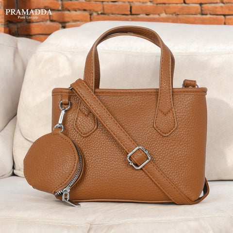 Classic Maria sling crossbody bag with coin pouch.